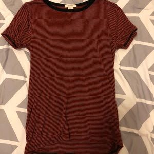 A reddish maroon striped t-shirt. It’s super cute